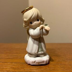 Precious Moments August figure